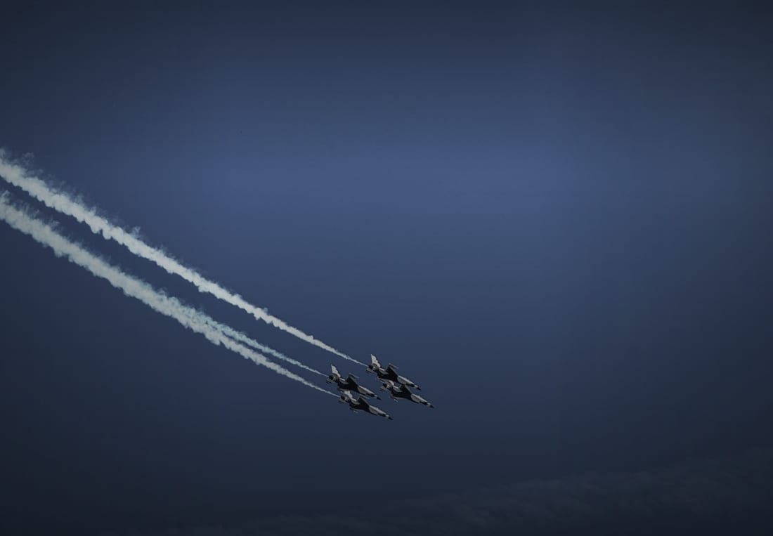 Four aircraft flying in close formation
